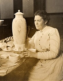 Adelaide Alsop Robineau working on her scarab vase